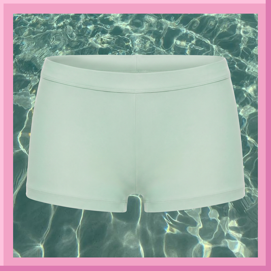 Light blue shorts on a background of clear water with a pink border